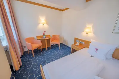 Ein Bett oder Betten in einem Zimmer der Unterkunft Chalét zum Kurfürst