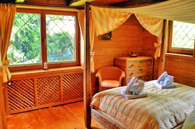 Ein Bett oder Betten in einem Zimmer der Unterkunft Chiemsee Landhaus