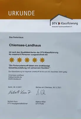 Ein Zertifikat, Auszeichnung, Logo oder anderes Dokument, das in der Unterkunft Chiemsee Landhaus ausgestellt ist