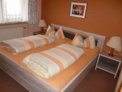 Ein Bett oder Betten in einem Zimmer der Unterkunft Ferienwohnungen Fontana