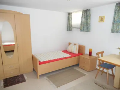 Ein Bett oder Betten in einem Zimmer der Unterkunft Haus An der Abens