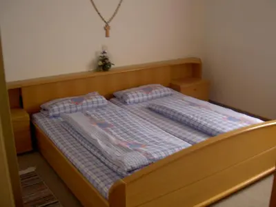 Ein Bett oder Betten in einem Zimmer der Unterkunft Haus An der Abens