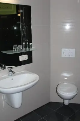 Ein Badezimmer in der Unterkunft Helmers Gästehaus