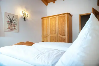 Ein Bett oder Betten in einem Zimmer der Unterkunft Pension Krüner Stub´n