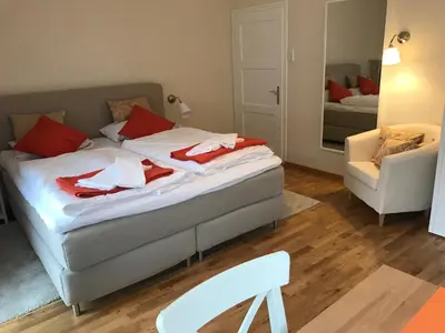 Ein Bett oder Betten in einem Zimmer der Unterkunft Ferienwohnung Magdalena - ruhig, zentral, schöne Sonnenterrasse