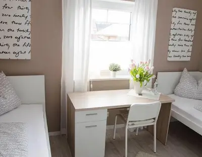 Ein Bett oder Betten in einem Zimmer der Unterkunft Pension M