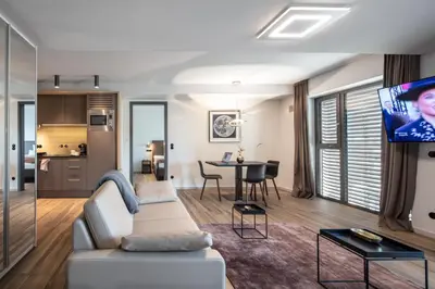 TV/Unterhaltungsangebot in der Unterkunft Golden Ball, Exclusive Serviced Apartments Munich