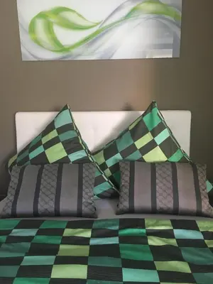 Ein Bett oder Betten in einem Zimmer der Unterkunft Bürgemeister Apartment