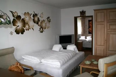 Ein Bett oder Betten in einem Zimmer der Unterkunft Ferienwohnung Jauß