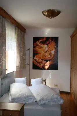 Ein Bett oder Betten in einem Zimmer der Unterkunft Ferienwohnung Jauß