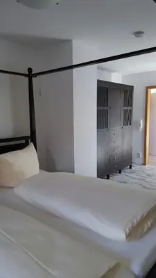 Ein Bett oder Betten in einem Zimmer der Unterkunft Landgasthof Haller