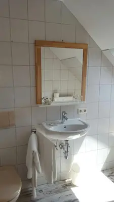 Ein Badezimmer in der Unterkunft Landgasthof Haller