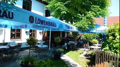 Ein Restaurant oder anderes Speiselokal in der Unterkunft Landgasthof Haller