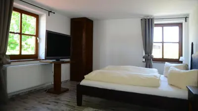 Ein Bett oder Betten in einem Zimmer der Unterkunft Landgasthof Haller