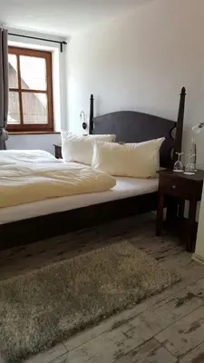 Ein Bett oder Betten in einem Zimmer der Unterkunft Landgasthof Haller