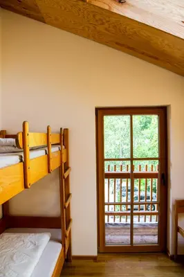 Ein Bett oder Betten in einem Zimmer der Unterkunft Jugendherberge Schliersee