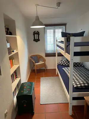 Ein Bett oder Betten in einem Zimmer der Unterkunft Chiemgau, Seeblick, Haus am Weinberg, 83370 Seeon Oberbayern