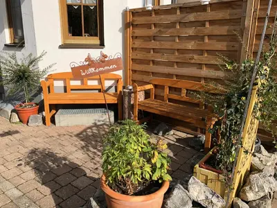 Ein Garten an der Unterkunft Ferienhaus Ferienwohnung Aretsried