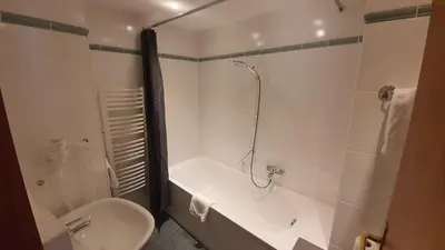 Ein Badezimmer in der Unterkunft Hotel Der Tannenbaum