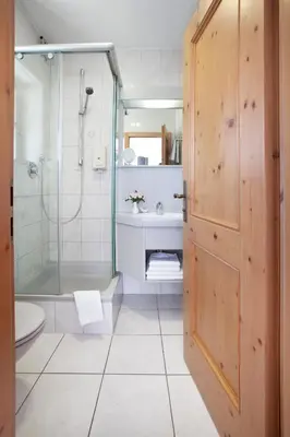 Ein Badezimmer in der Unterkunft Hotel Hubertus