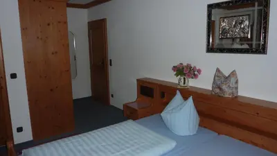 Ein Bett oder Betten in einem Zimmer der Unterkunft Hotel Hubertus