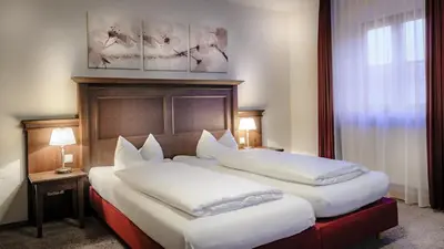 Ein Bett oder Betten in einem Zimmer der Unterkunft Restaurant-Café-Pension Himmel