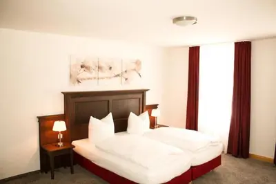 Ein Bett oder Betten in einem Zimmer der Unterkunft Restaurant-Café-Pension Himmel