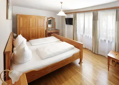 Ein Bett oder Betten in einem Zimmer der Unterkunft Restaurant-Café-Pension Himmel