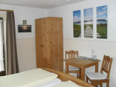 Ein Bett oder Betten in einem Zimmer der Unterkunft Dowis-Hof