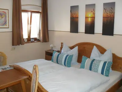 Ein Bett oder Betten in einem Zimmer der Unterkunft Dowis-Hof