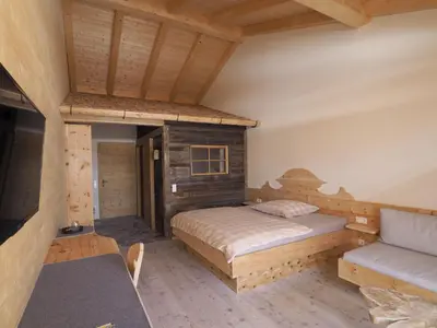 Ein Bett oder Betten in einem Zimmer der Unterkunft Kleines Zirbelhotel - ÜF
