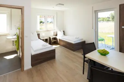 Ein Bett oder Betten in einem Zimmer der Unterkunft Green Guest House