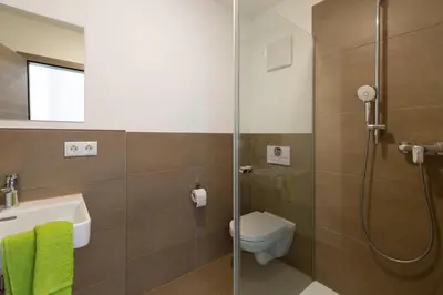 Ein Badezimmer in der Unterkunft Green Guest House