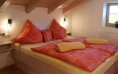 Ein Bett oder Betten in einem Zimmer der Unterkunft Bergblick