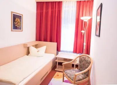 Ein Sitzbereich in der Unterkunft Hotel Giesing
