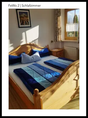 Ein Bett oder Betten in einem Zimmer der Unterkunft Schwaigerhof
