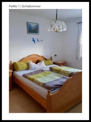 Ein Bett oder Betten in einem Zimmer der Unterkunft Schwaigerhof