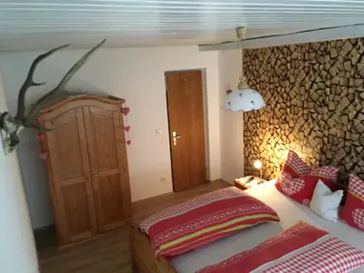 Ein Bett oder Betten in einem Zimmer der Unterkunft Ferienhaus Ursula