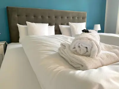 Ein Bett oder Betten in einem Zimmer der Unterkunft Apartment SEEnsucht - Tolle Lage, nah am See, perfekt für Familien