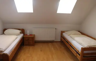 Ein Bett oder Betten in einem Zimmer der Unterkunft Gersthof