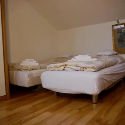 Ein Bett oder Betten in einem Zimmer der Unterkunft Apartment Kobellstrasse