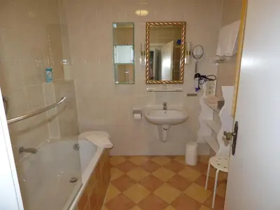 Ein Badezimmer in der Unterkunft Hotel Engelhof