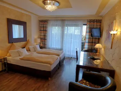 Ein Bett oder Betten in einem Zimmer der Unterkunft Hotel Engelhof