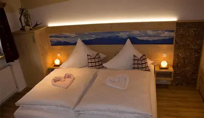 Ein Bett oder Betten in einem Zimmer der Unterkunft Pension Gerstenbrand