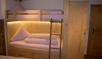 Ein Bett oder Betten in einem Zimmer der Unterkunft Pension Gerstenbrand