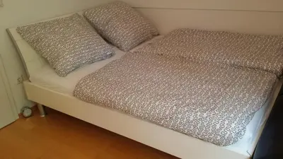 Ein Bett oder Betten in einem Zimmer der Unterkunft Wiflinger Graben Einfamilienhaus