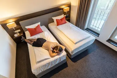 Ein Bett oder Betten in einem Zimmer der Unterkunft Hotel Duda Langenbruck an der A9 zwischen Ingolstadt und München, ideal für Stopover, Geschäftsreisen und Monteure