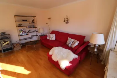 Ein Sitzbereich in der Unterkunft Alpen - Apartments
