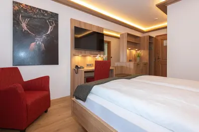 Ein Bett oder Betten in einem Zimmer der Unterkunft Pension Ludwig Thoma