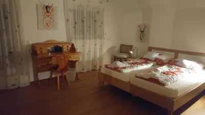Ein Bett oder Betten in einem Zimmer der Unterkunft Ferientraum Kobellstrasse